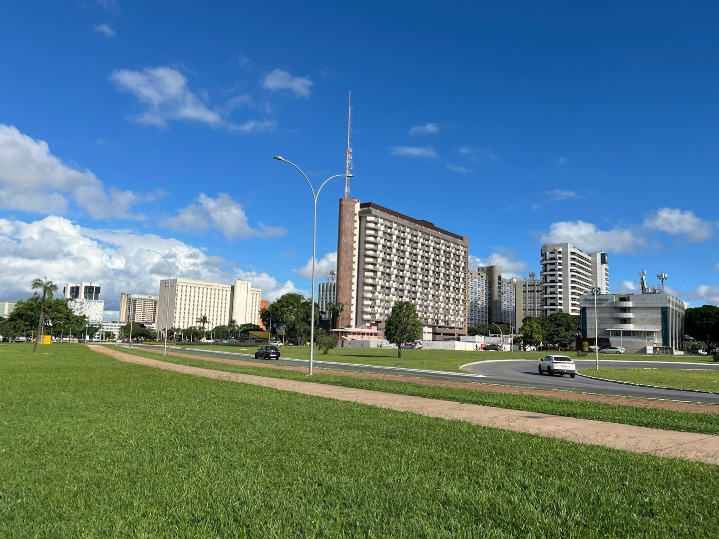 Modern urban infrastructure and commercial buildings in Qatar under a clear blue sky, representing Smart Agnes’s MEP and Civil Works expertise in large-scale city developments.
